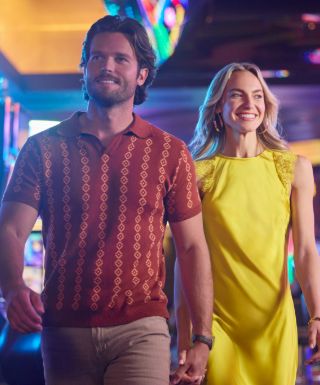 couple walking through casino